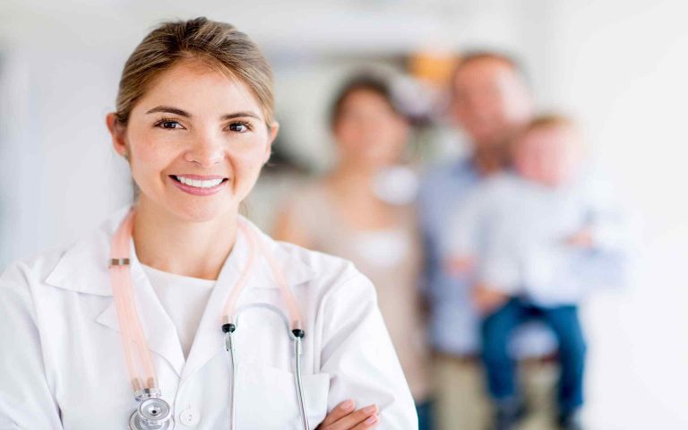 Dentist with the blur family background