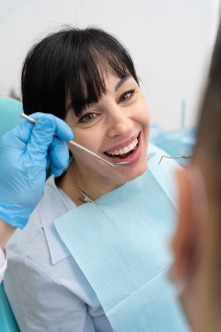 imgi_17_dentist-doing-check-up-patient_23-2149206243