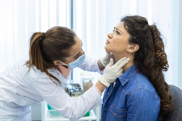 https://lakemagdalenedental.com/wp-content/uploads/2025/06/imgi_7_endocrinologist-examining-throat-yo.png