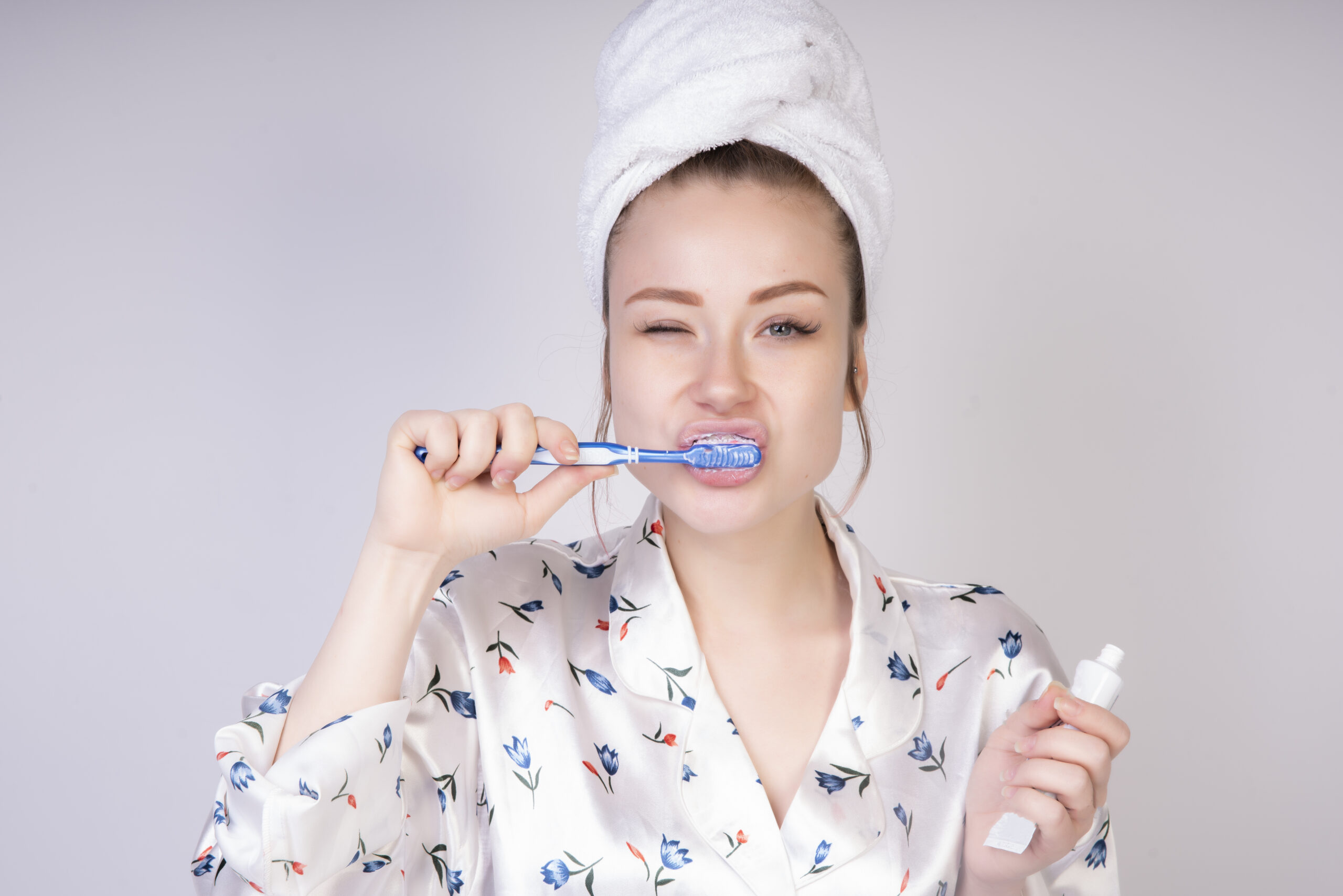 poking girl while washing her teeth