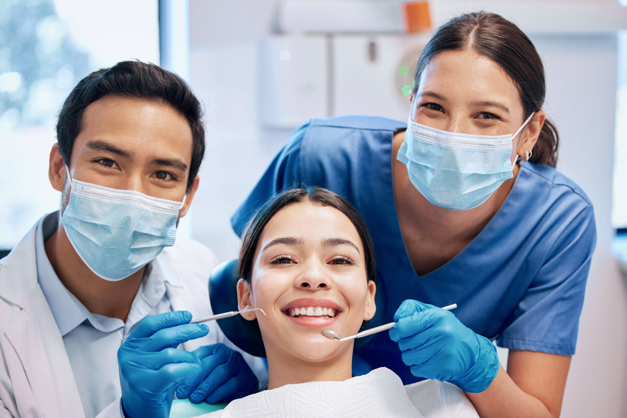 Portrait of dentist and woman in consultation for teeth whitening, service and dental care. Healthcare, dentistry and orthodontist with equipment for patient for oral hygiene, wellness and cleaning.